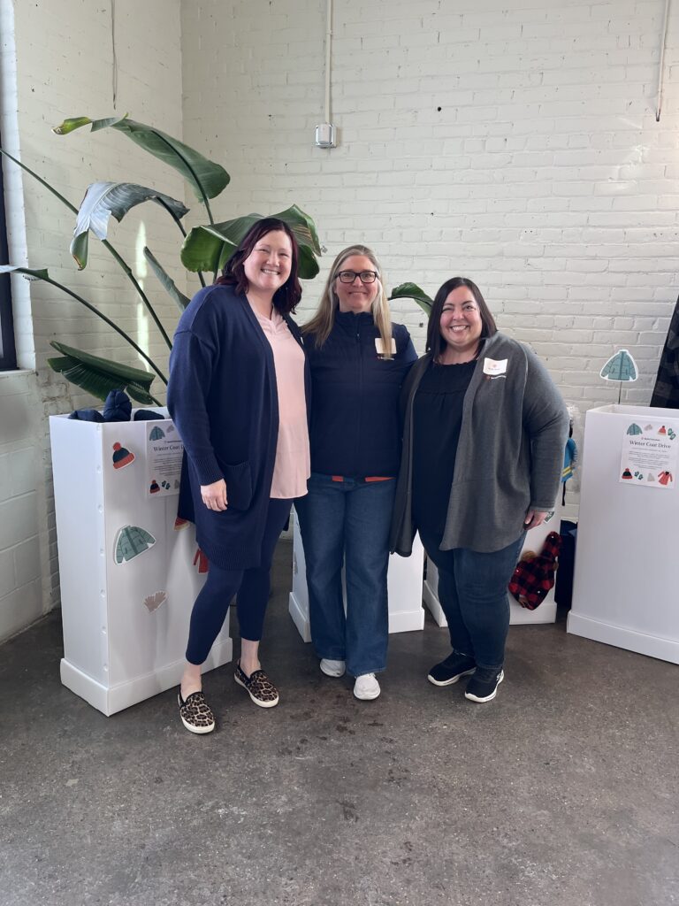 BankCherokee team members donating coats